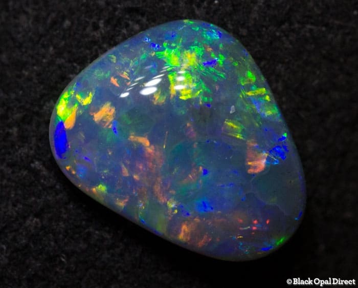 0.86 ct semi black crystal opal 8.5x7x2.5mm - Image 4