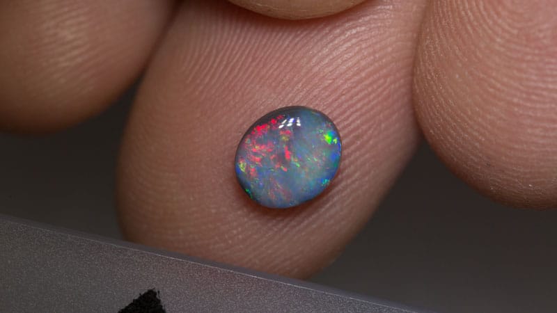 0.87 ct black opal 7x6x2.5mm - Image 2