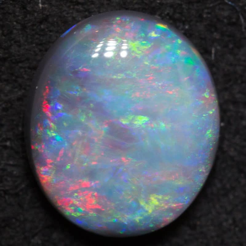 0.87 ct black opal 7x6x2.5mm - Image 3