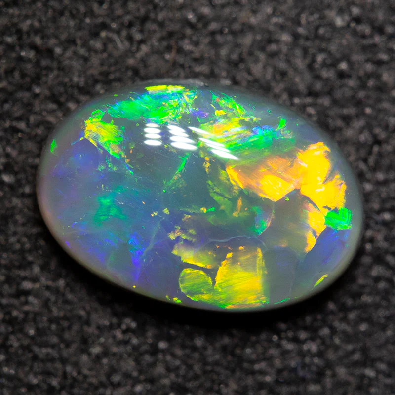 0.87 ct black opal 8.1x5.7x2.7mm - Image 3