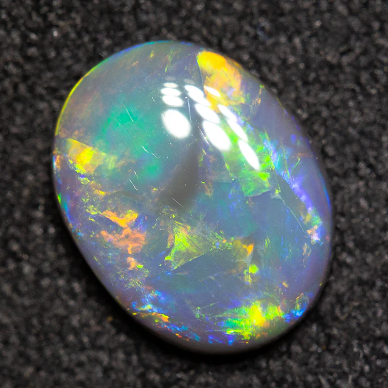 0.87 ct black opal 8.4x6.5x2.4mm - Image 3
