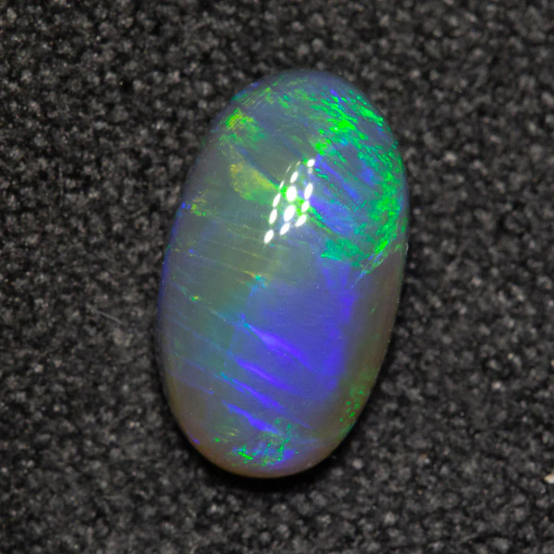 0.87 ct black opal 8.6x5x3.1mm - Image 3