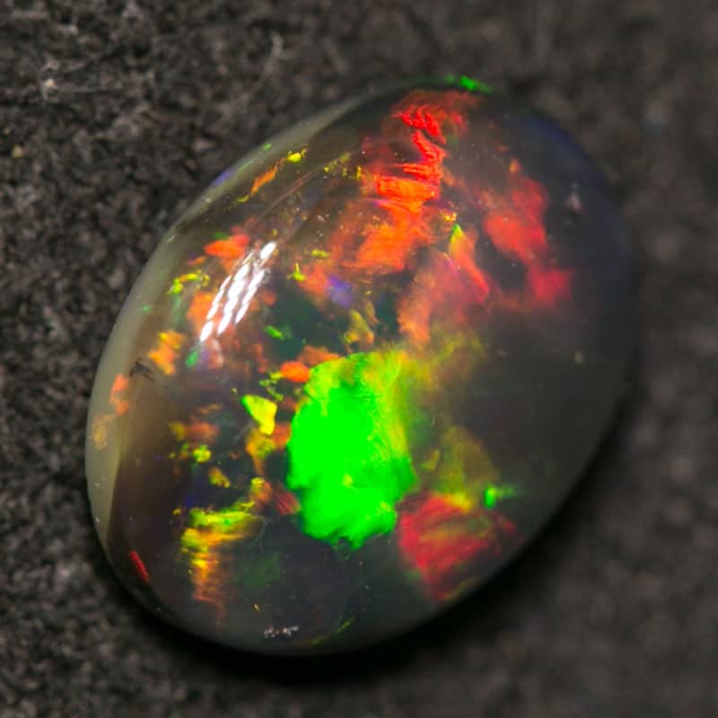 0.87 ct black opal 8x6x3mm - Image 2