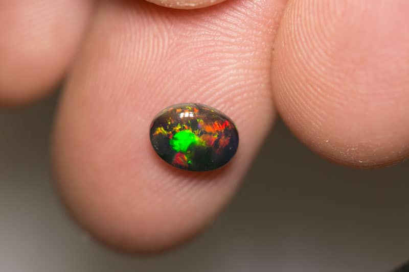 0.87 ct black opal 8x6x3mm - Image 3