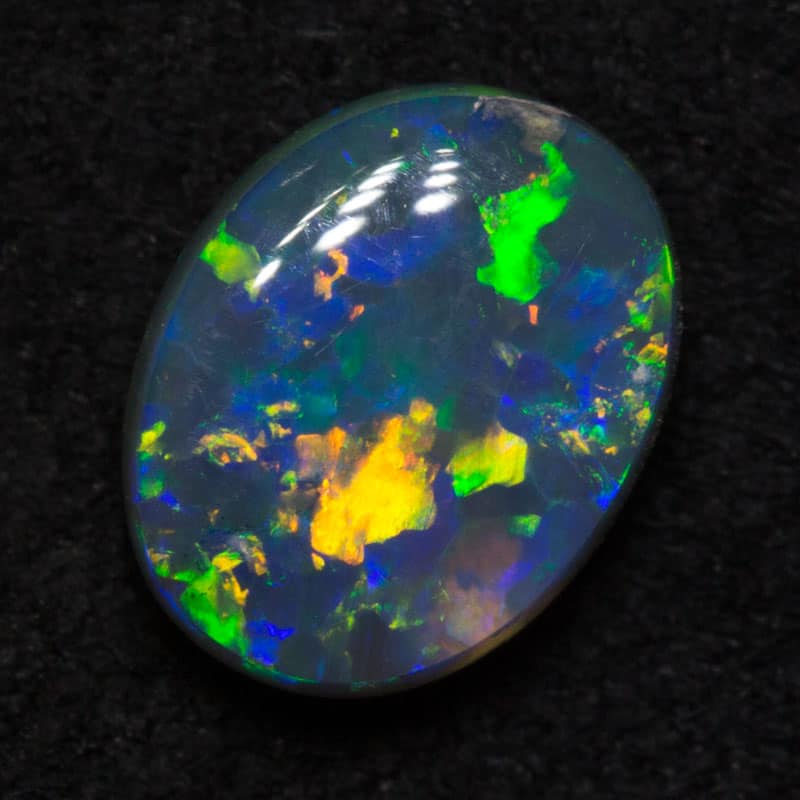 0.87 ct dark crystal opal 7x5.5x3mm - Image 2