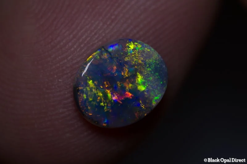 0.87 ct semi black opal 9x7.5x2mm - Image 2