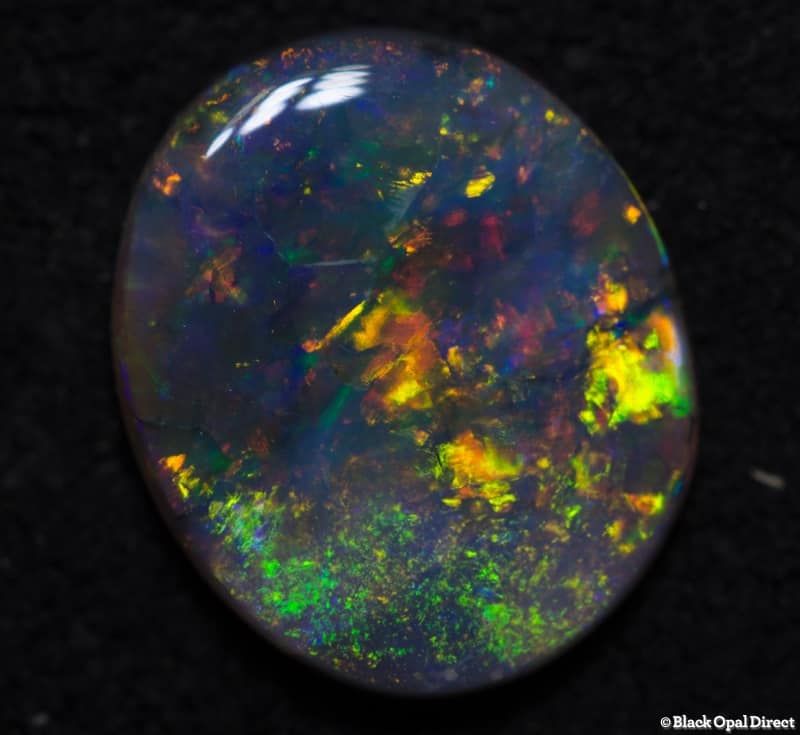 0.87 ct semi black opal 9x7.5x2mm - Image 3