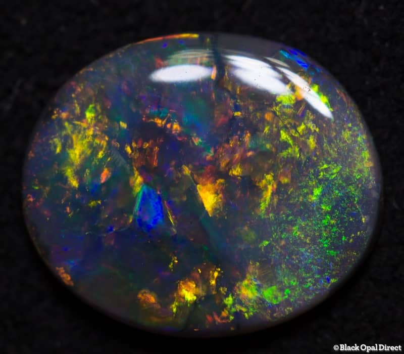 0.87 ct semi black opal 9x7.5x2mm - Image 4