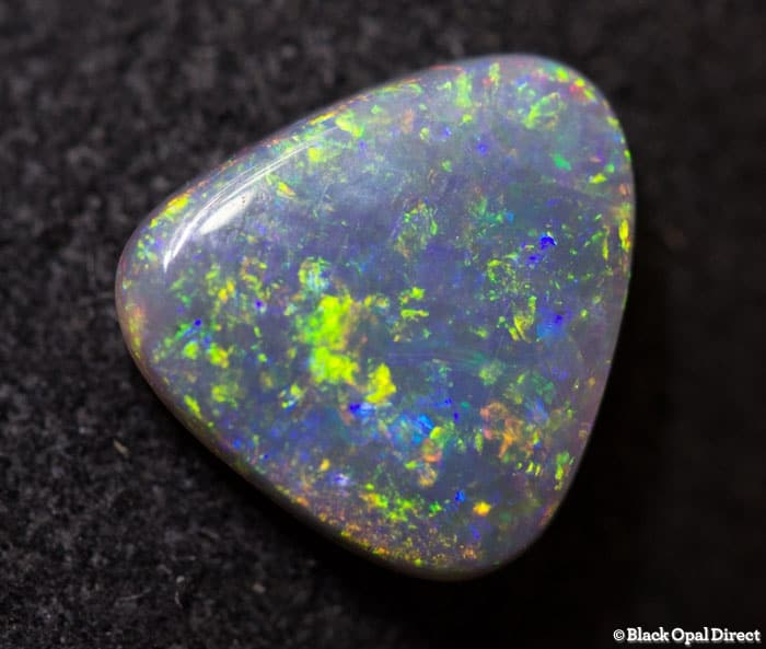 0.87 ct triangle shaped opal double sided 8x7x2mm - Image 2
