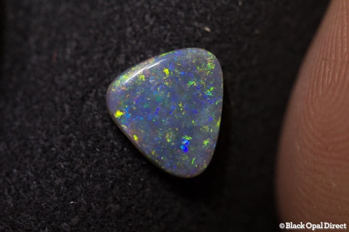 0.87 ct triangle shaped opal double sided 8x7x2mm - Image 4