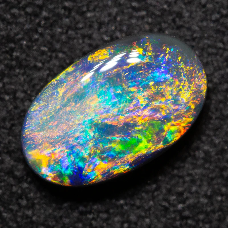 0.88 ct black opal 8.1x5x3.1mm - Image 2