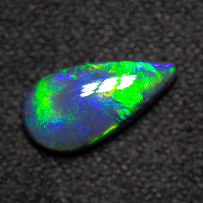 0.88 ct black opal 9.6x5x2.9mm - Image 4