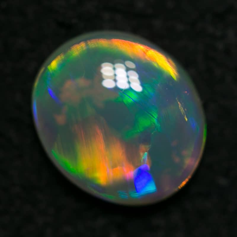 0.88 ct crystal opal 7x6x2mm - Image 2