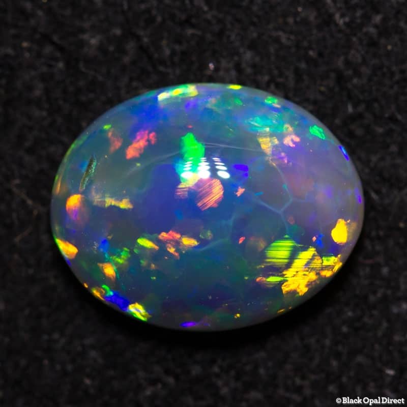 0.88 ct dark crystal opal 8x6x3 - Image 2