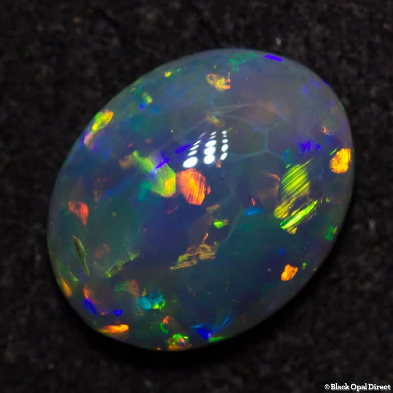 0.88 ct dark crystal opal 8x6x3 - Image 3