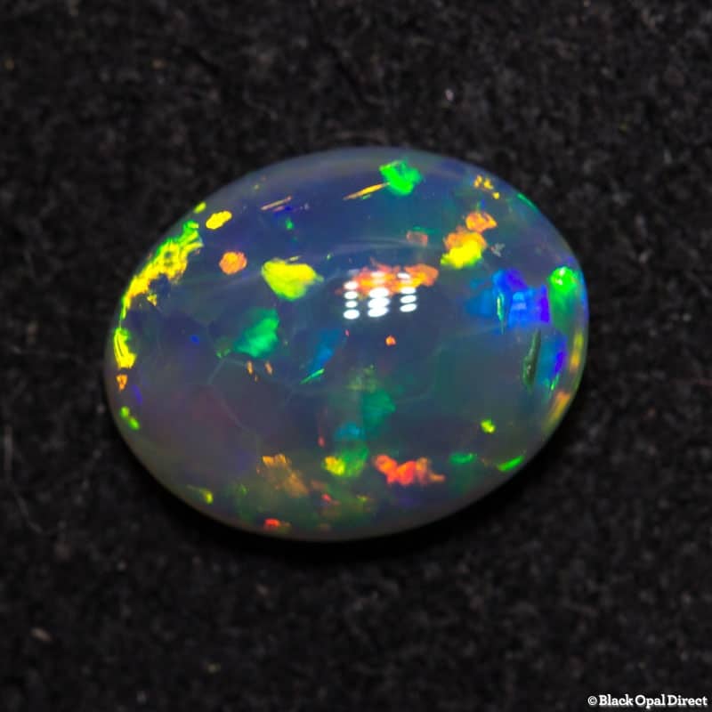 0.88 ct dark crystal opal 8x6x3 - Image 4
