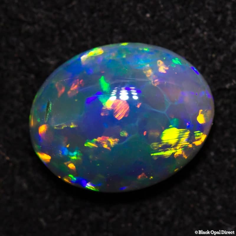 0.88 ct dark crystal opal 8x6x3 - Image 5