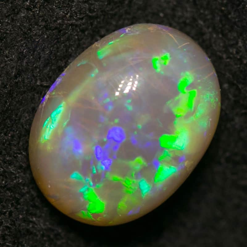 0.88 ct dark opal 7x5x4mm - Image 2