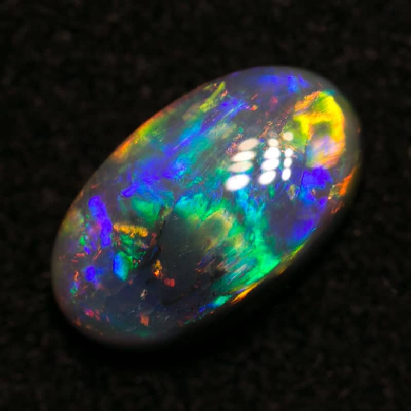 0.88 ct dark opal 8x5x3mm - Image 2