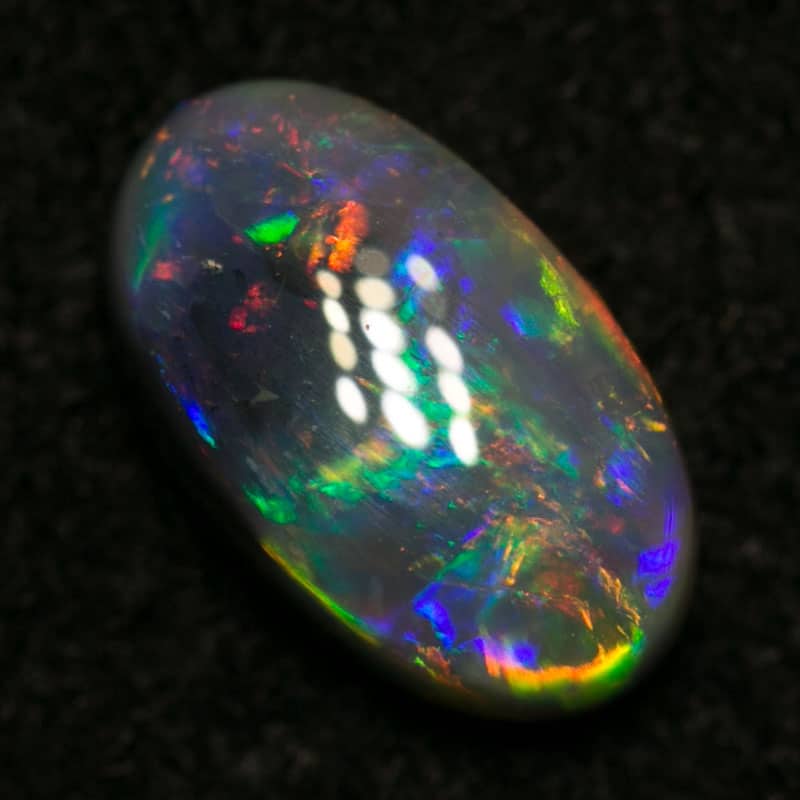 0.88 ct dark opal 8x5x3mm - Image 3