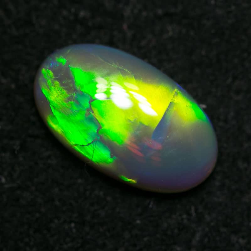 0.88 ct double sided crystal opal 9x5x2.5mm - Image 2