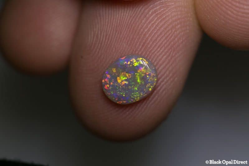 0.88 ct semi black opal 8.5x7x2mm - Image 3