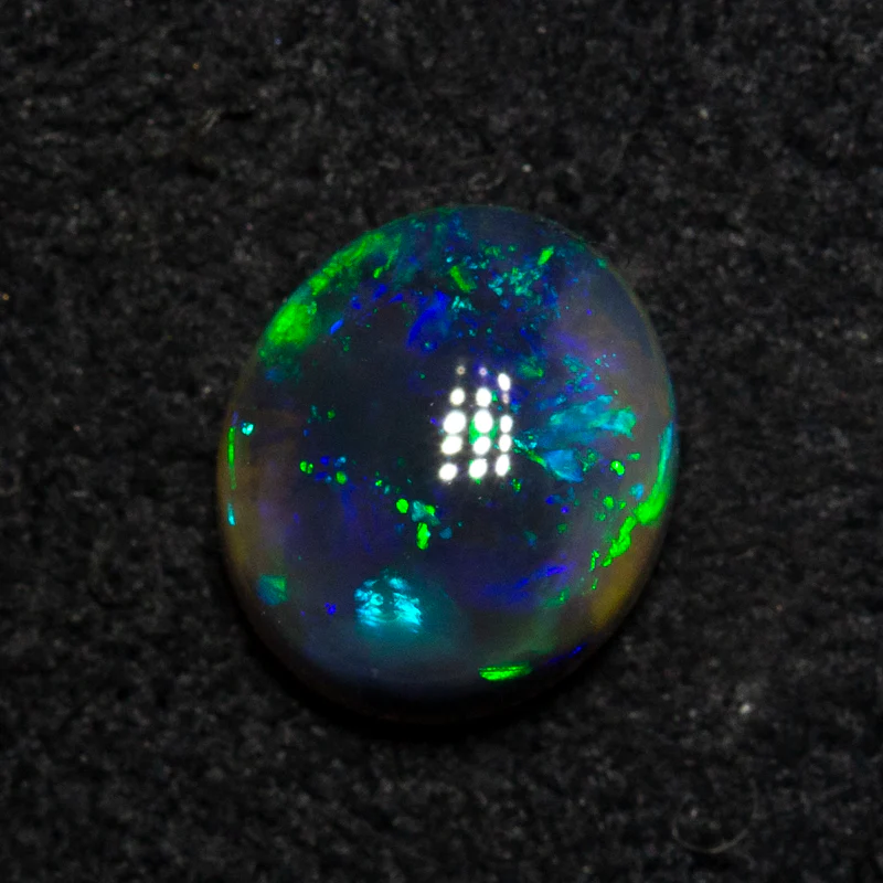 0.89 ct black opal 7x6.1x3.4mm - Image 3