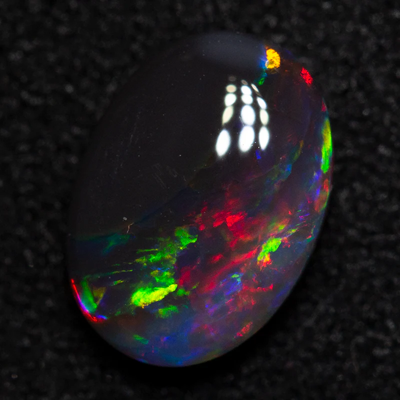 0.89 ct black opal 8x5.8x2.8mm - Image 3