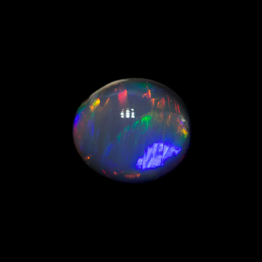 0.90 ct black opal 6.7x5.6x3.9mm - Image 2