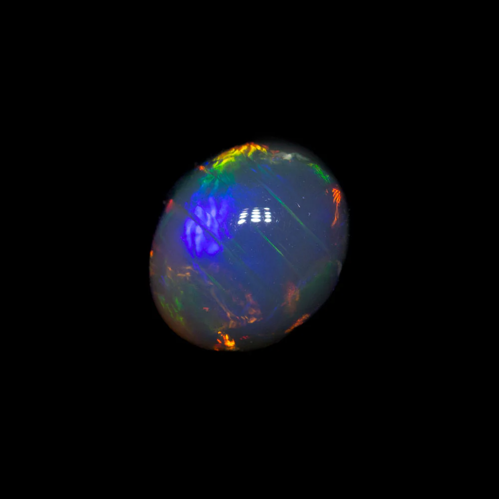 0.90 ct black opal 6.7x5.6x3.9mm - Image 3