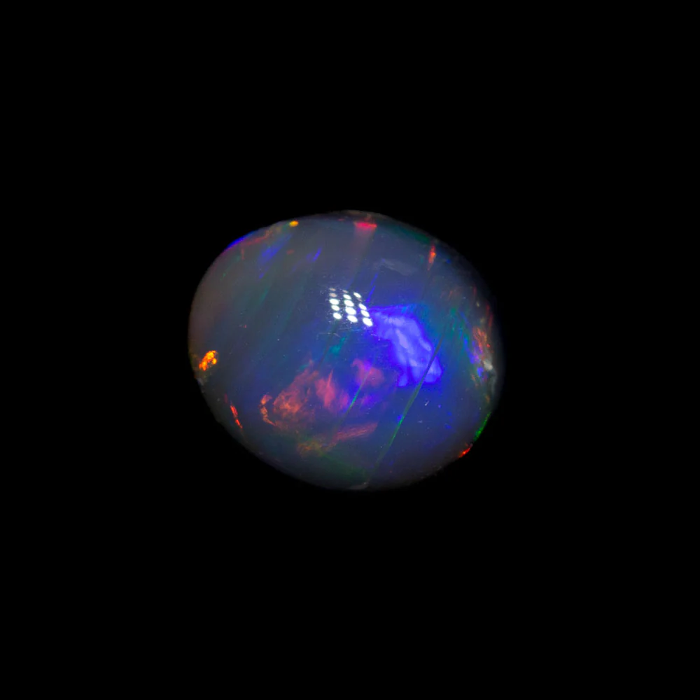 0.90 ct black opal 6.7x5.6x3.9mm - Image 4
