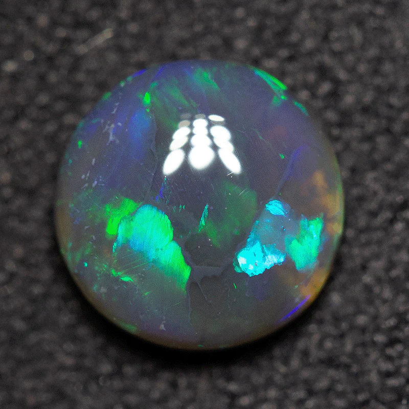 0.90 ct black opal 6.9x6.8x3.1mm - Image 2