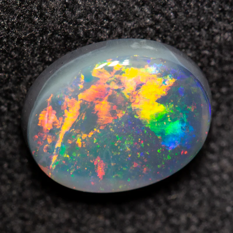 0.90 ct black opal 7.7x6x2.6mm - Image 2