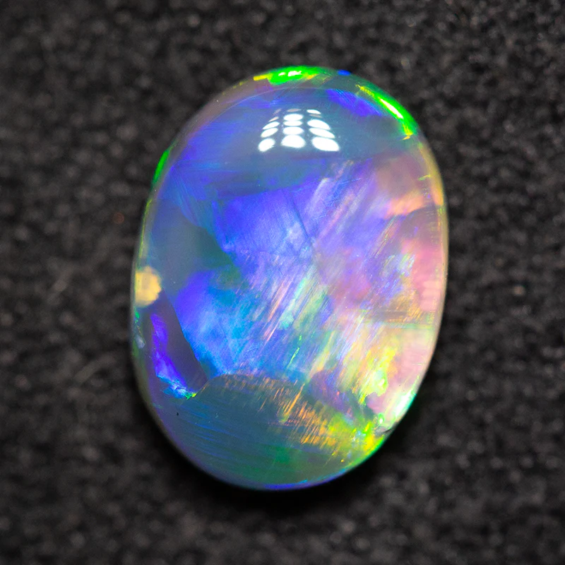 0.90 ct black opal 7.9x5.8x3.2mm - Image 2