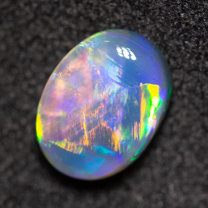 0.90 ct black opal 7.9x5.8x3.2mm - Image 3