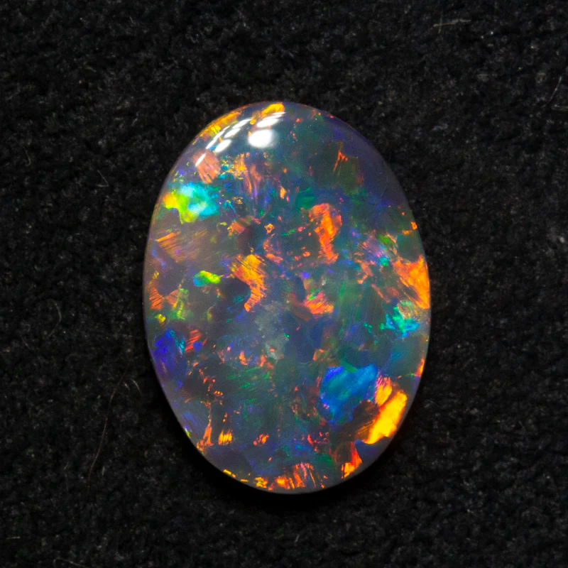 0.90 ct black opal 9.2x6.7x2.3mm - Image 2