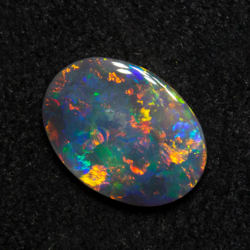 0.90 ct black opal 9.2x6.7x2.3mm - Image 3
