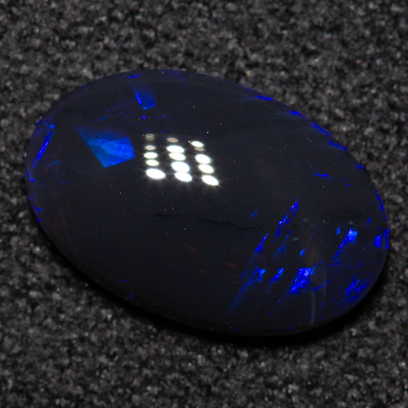 0.90 ct black opal 9.3x6.1x2.5mm - Image 2