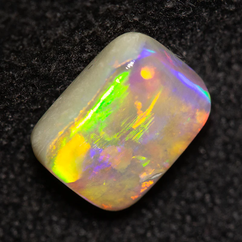 0.90 ct dark opal 6.8x5.2x2.9mm - Image 2