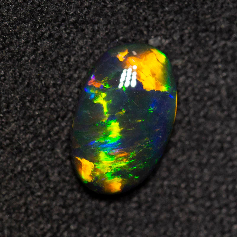 0.90 ct gem black opal 8.8x5.9x2.7mm - Image 5