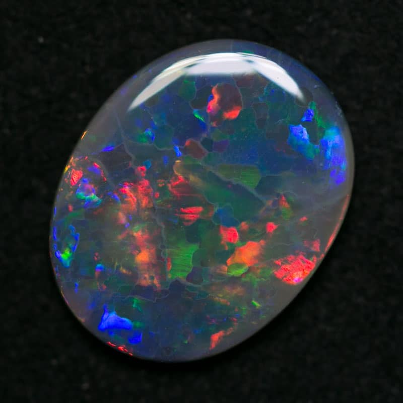 0.91 ct black opal 10x7.5x1.5mm - Image 2