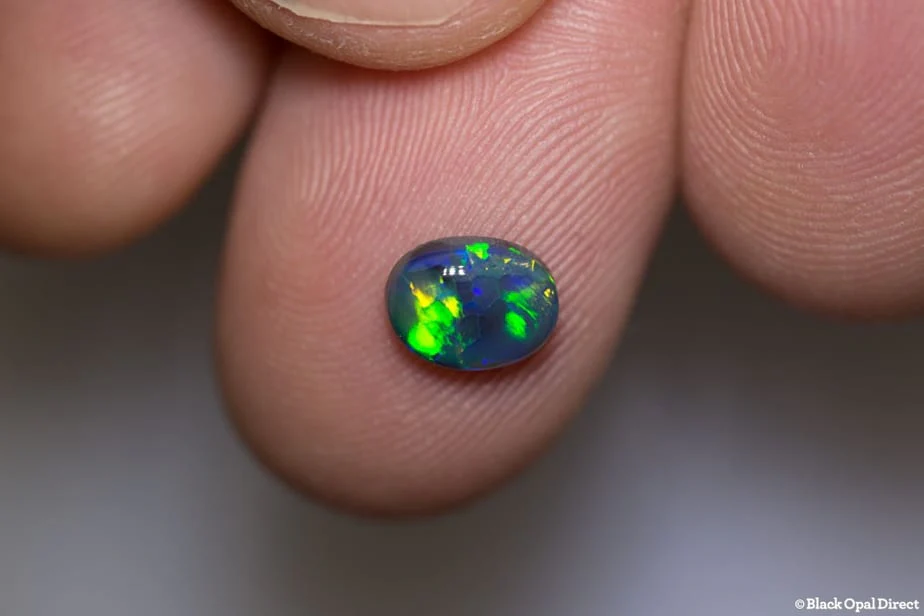 0.91 ct black opal 7.5x5.5x3mm - Image 2