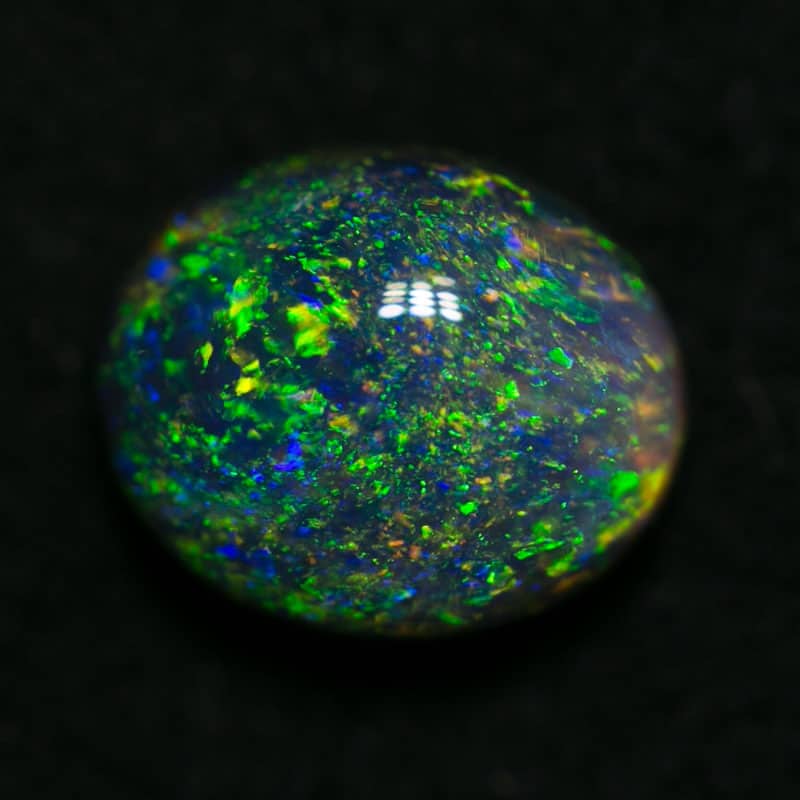 0.91 ct black opal 7x5.5x3.5mm - Image 2