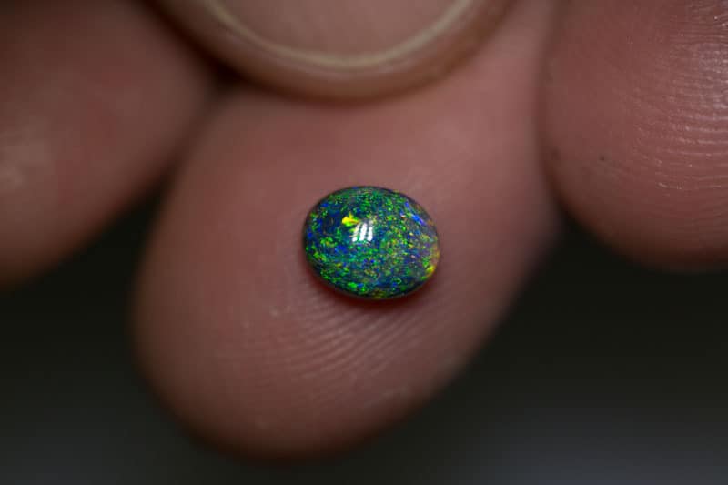 0.91 ct black opal 7x5.5x3.5mm - Image 3