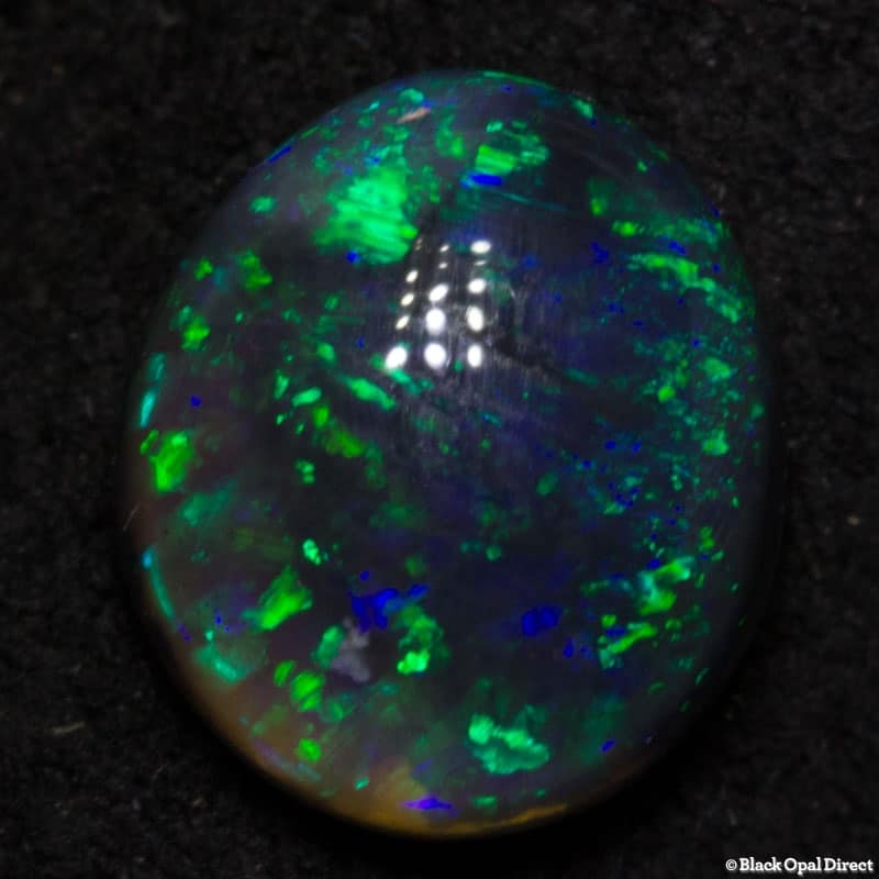 0.91 ct black opal 7x6x3mm - Image 3