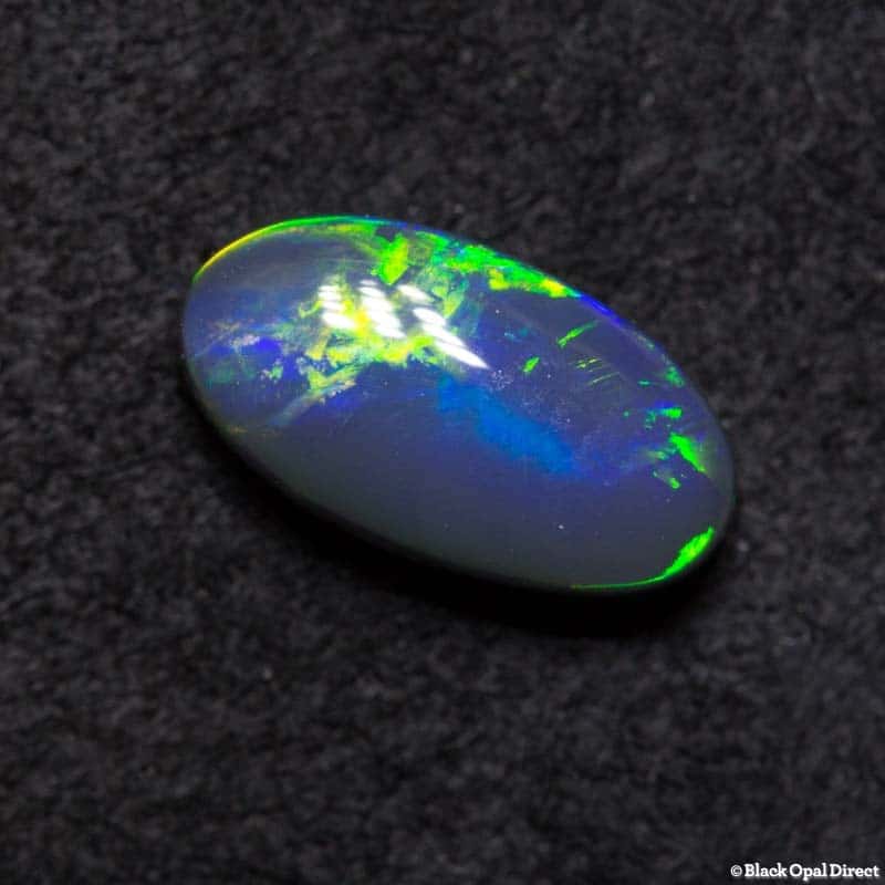 0.91 ct black opal 8.6x5x3mm - Image 4