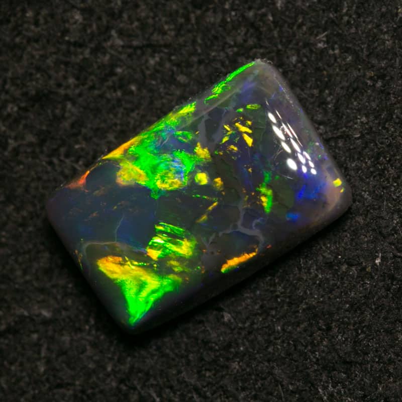 0.91 ct black opal 8x5x2.5mm - Image 2