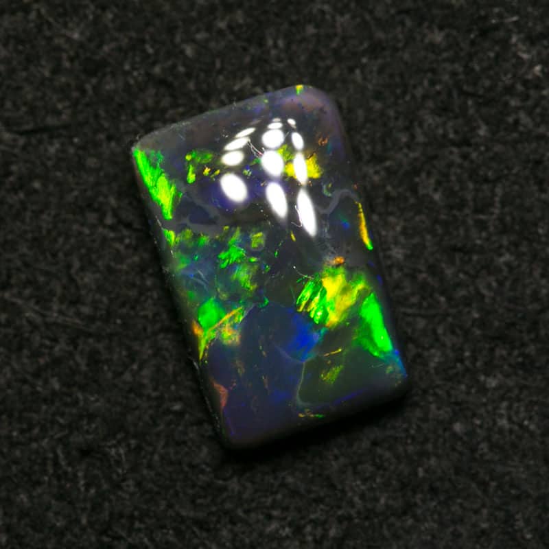 0.91 ct black opal 8x5x2.5mm - Image 3