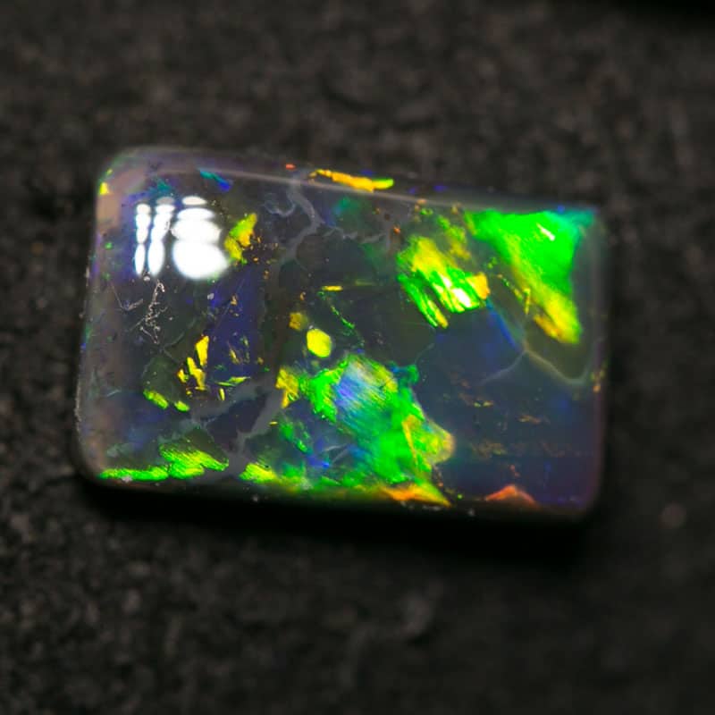0.91 ct black opal 8x5x2.5mm - Image 4