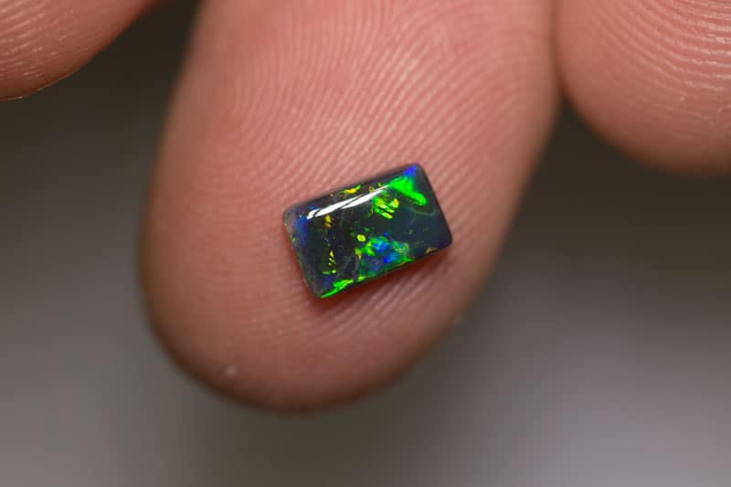 0.91 ct black opal 8x5x2.5mm - Image 5